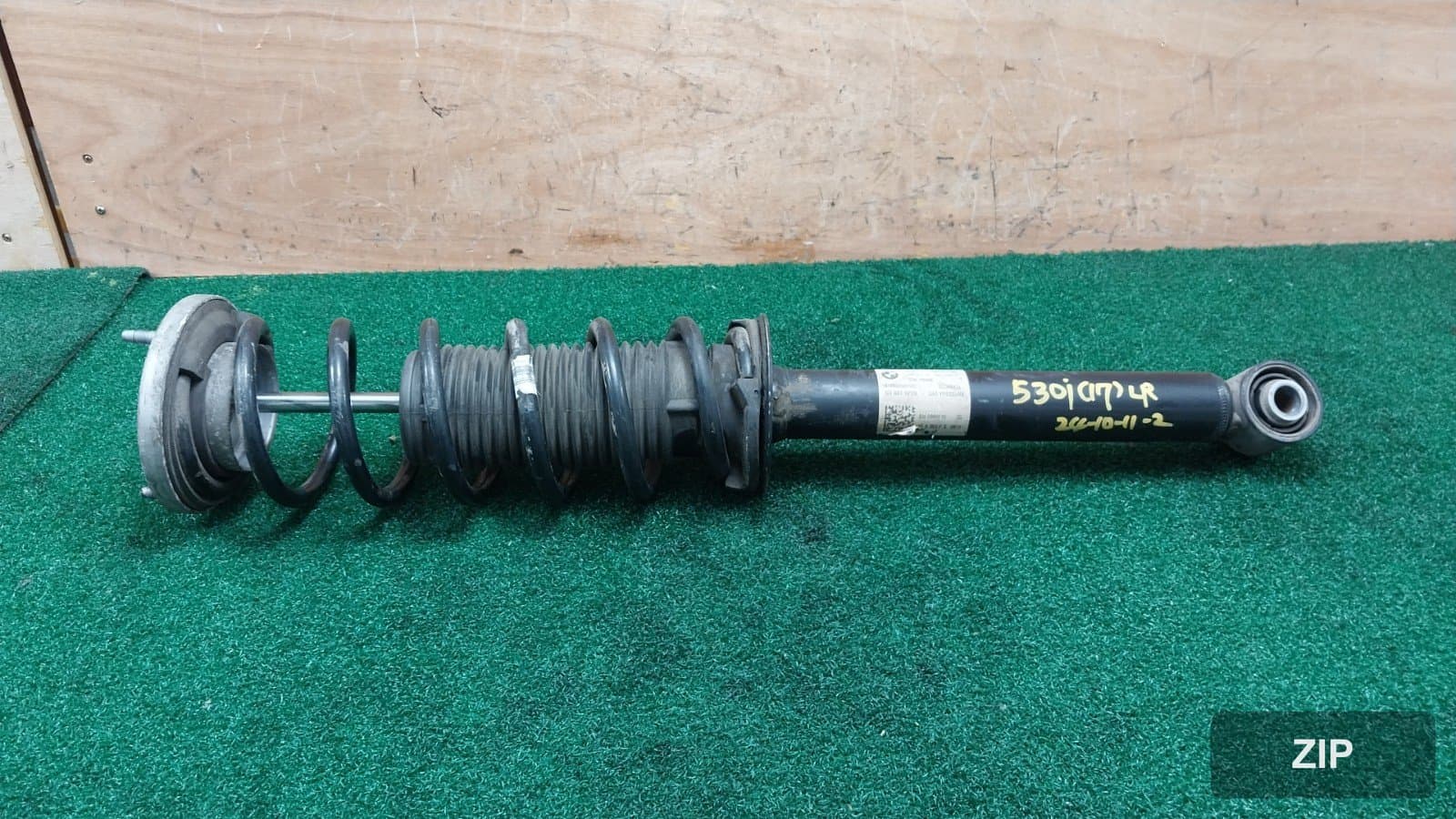 Амортизатор задний левый