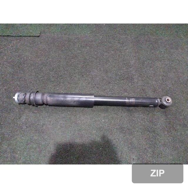 Амортизатор задний левый