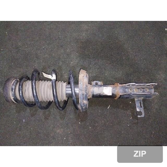 Амортизатор передний левый