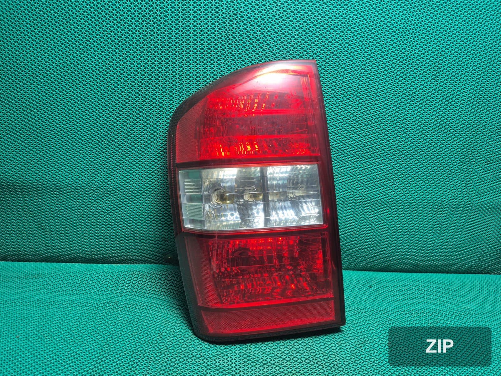 Kia New Carnival 2010 — задний фонарь левый 924014D1