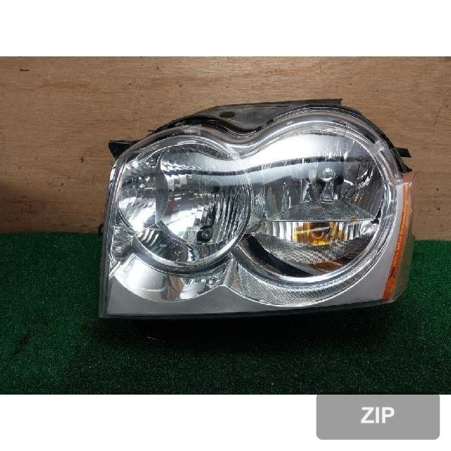 Jeep Grand Cherokee 2007 — фара передняя левая 55156671AI