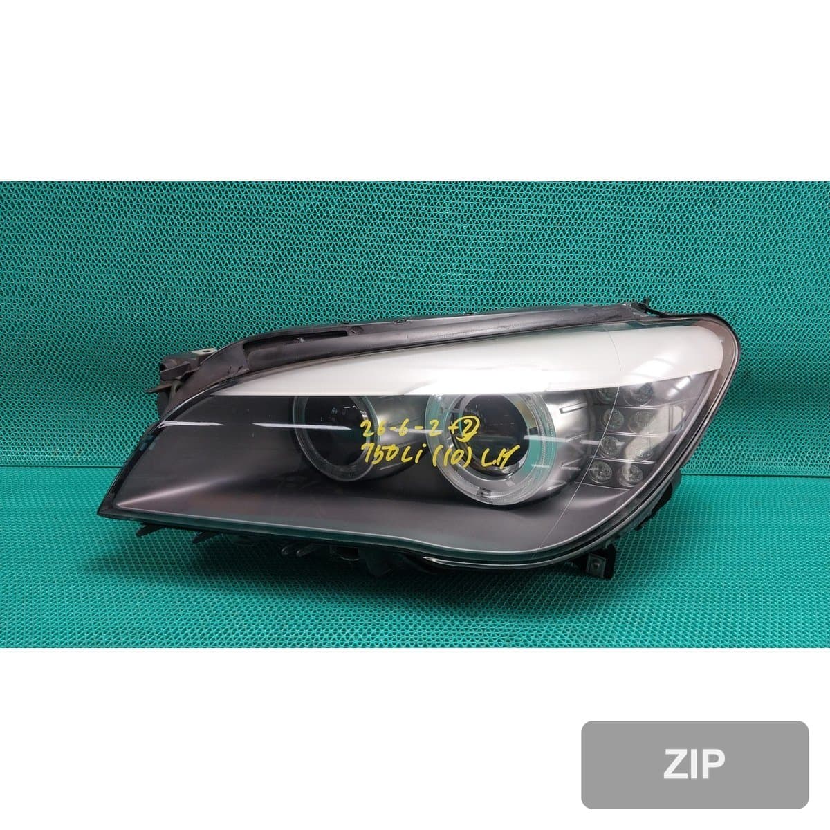BMW 750Li 2010 — фара левая