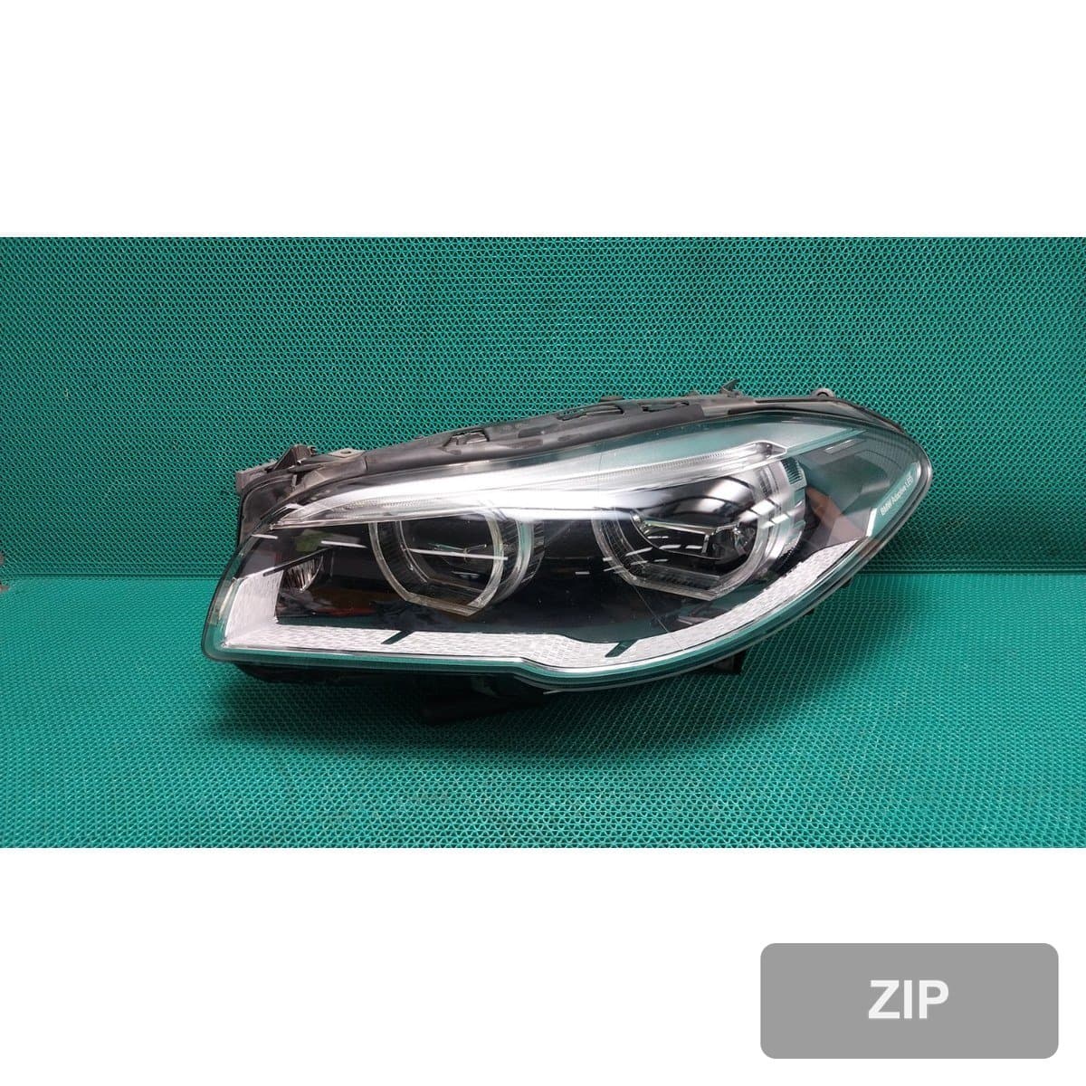 BMW 520d 2013 — фара левая