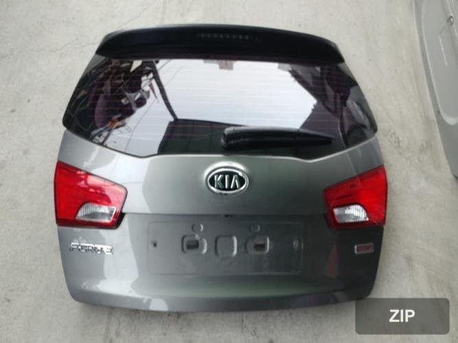 Kia Forte 2011 — крышка багажника