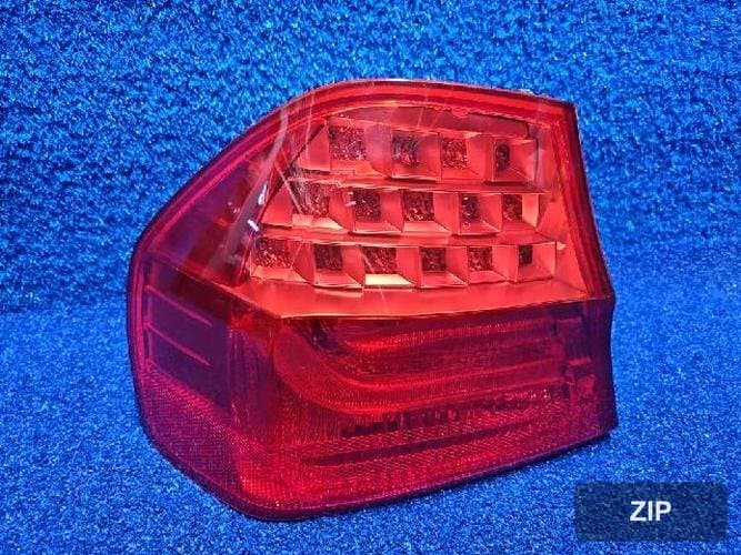 BMW 3 Series 2009 — фонарь левый наружный 7154153
