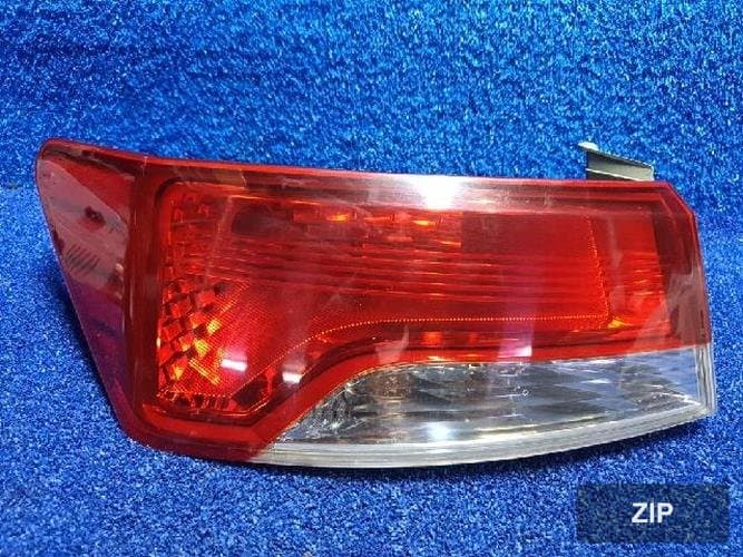 Kia Forte 2010 — задний фонарь левый наружный 1
