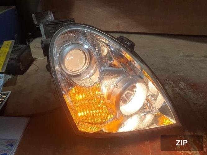 KG Mobility Rexton 2006 — фара правая