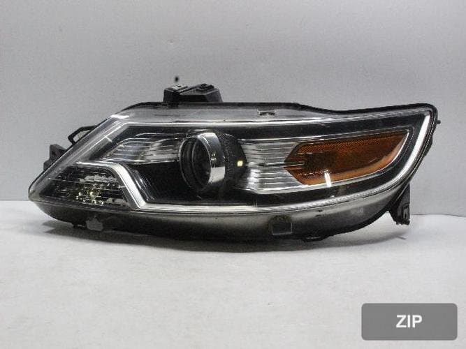 Ford Taurus 2011 — фара левая