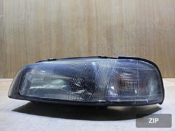 Renault SM5 2001 — фара левая