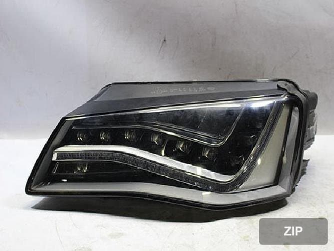 Audi A8 2010 — фара левая