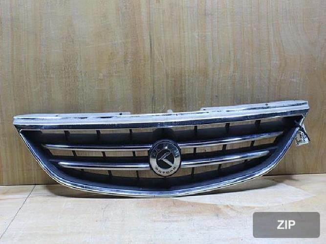 Kia Extrek 2003 — решётка радиатора 0K2FA50710