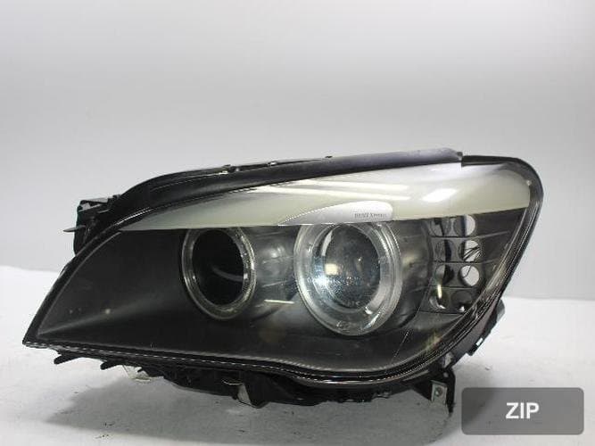 BMW 7 Series 2009 — фара левая