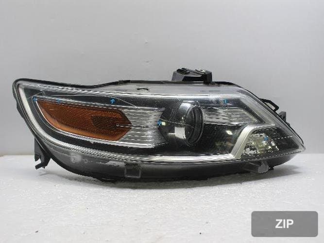 Ford Taurus 2010 — фара правая 1