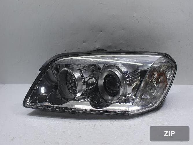 GM Daewoo Winstorm 2010 — фара левая