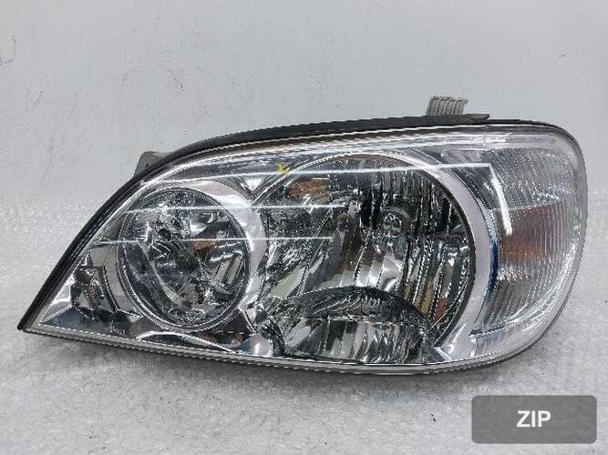 Kia Carnival 2003 — фара левая 0K53A 51020