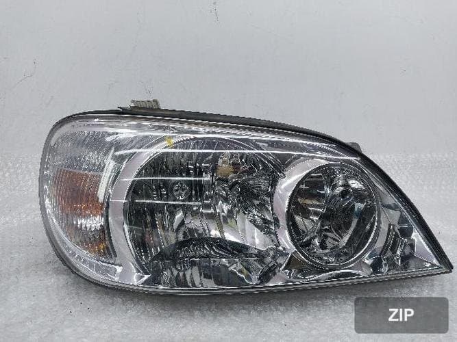 Kia Carnival 2003 — фара правая 0K53A 51020