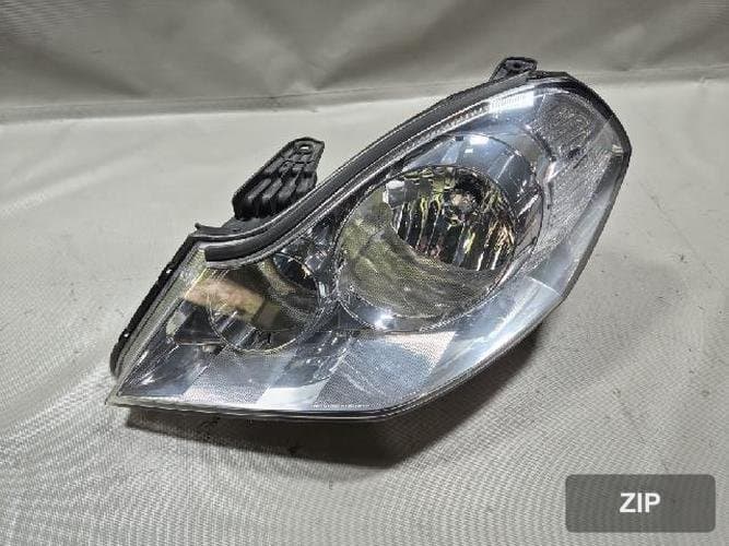 Renault SM5 2009 — фара левая HID