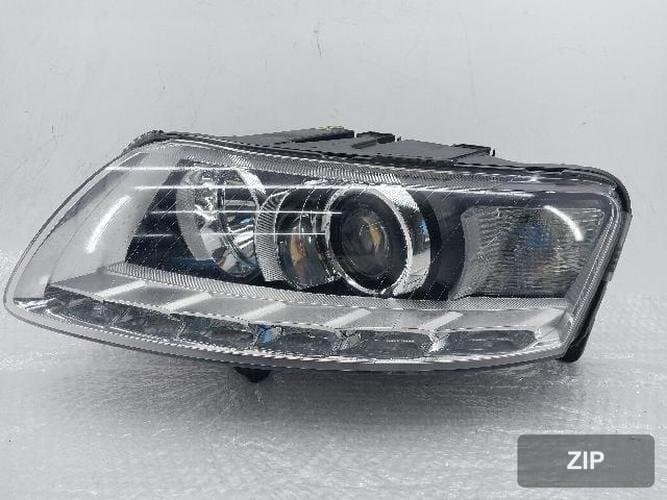 Audi A6 2009 — фара левая