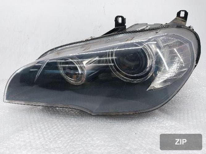 BMW X5 2009 — фара левая (ксенон HID)