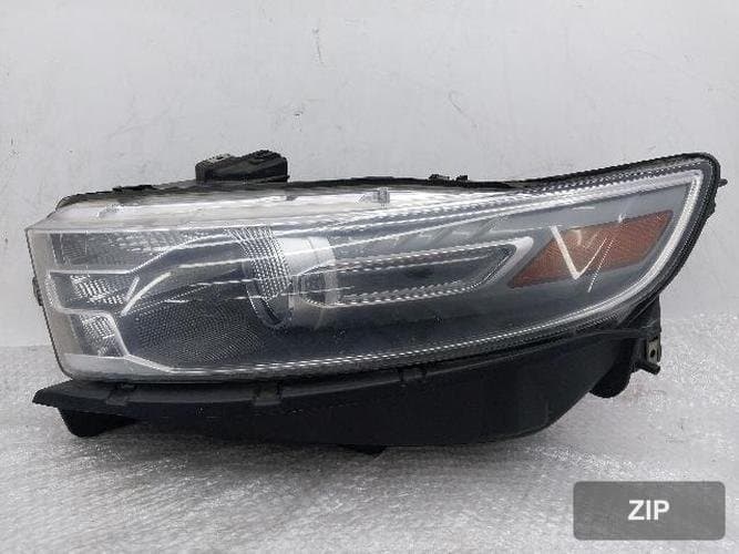 Ford Taurus 2014 — фара левая DG13-13006-AF