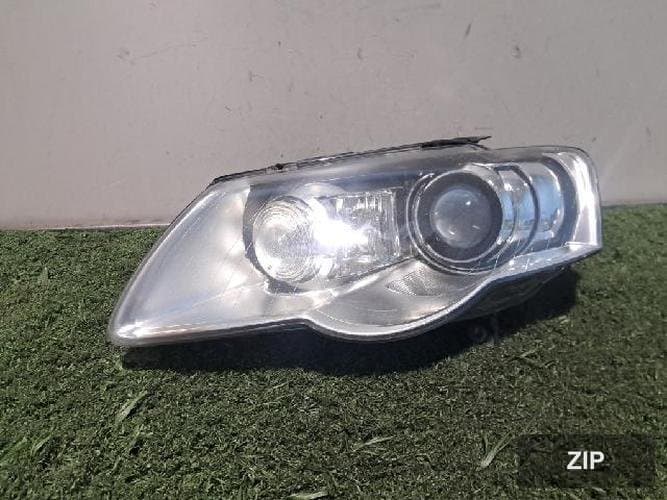 Volkswagen Passat 2009 — фара головного света левая HID