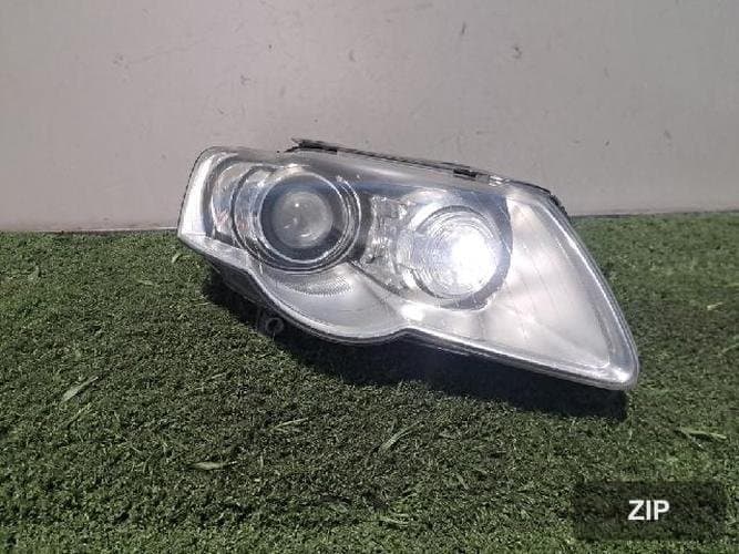 Volkswagen Passat 2009 — фара головного света правая HID