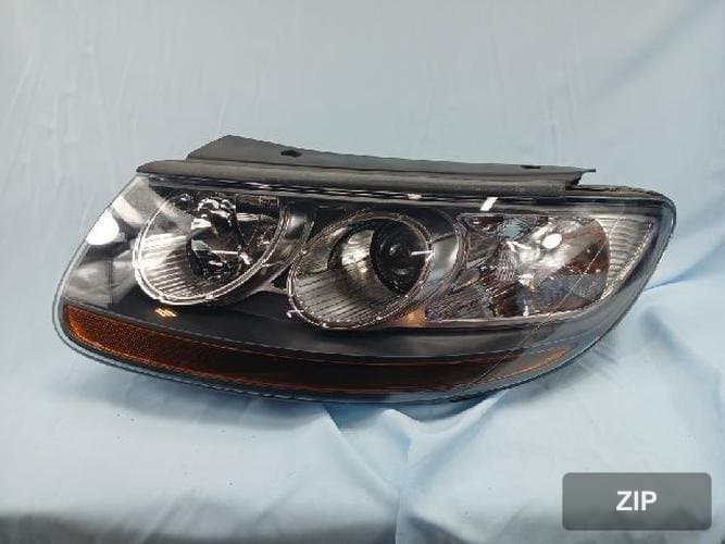 Hyundai Santa Fe 2012 — фара передняя левая