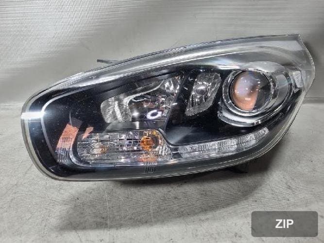 Kia Carens 2014 — фара левая