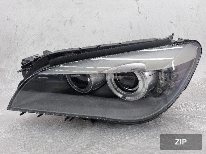BMW 7-серия 2010 — фара левая (HID) 6311-7225229-1