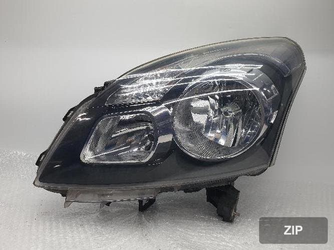Renault QM5 2009 — фара левая