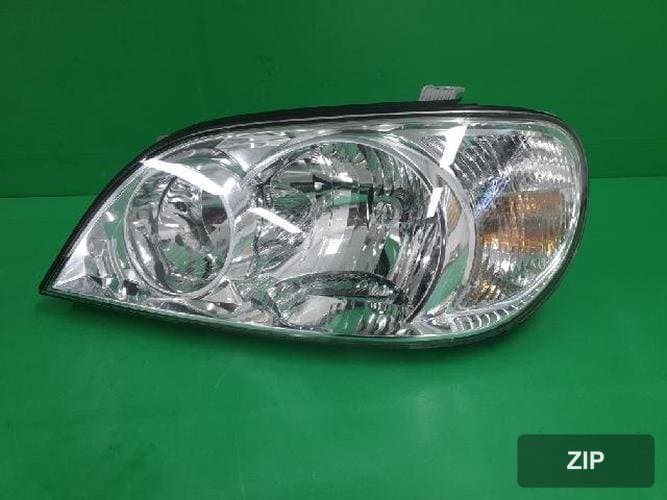 Kia Carnival 2002 — фара левая 0K55351040B