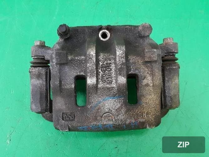 Hyundai Porter 2006 — тормозной суппорт передний левый 581104F000