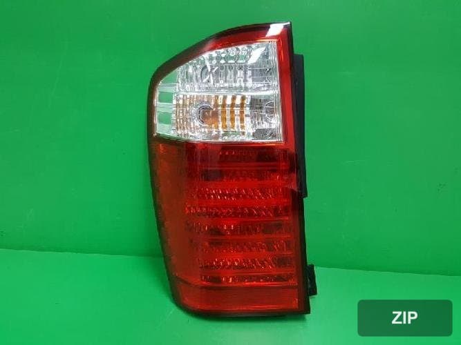 Kia Carnival 2006 — комбинированный задний фонарь левый