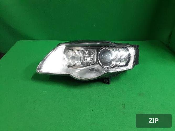Volkswagen Passat 2009 — фара левая HID