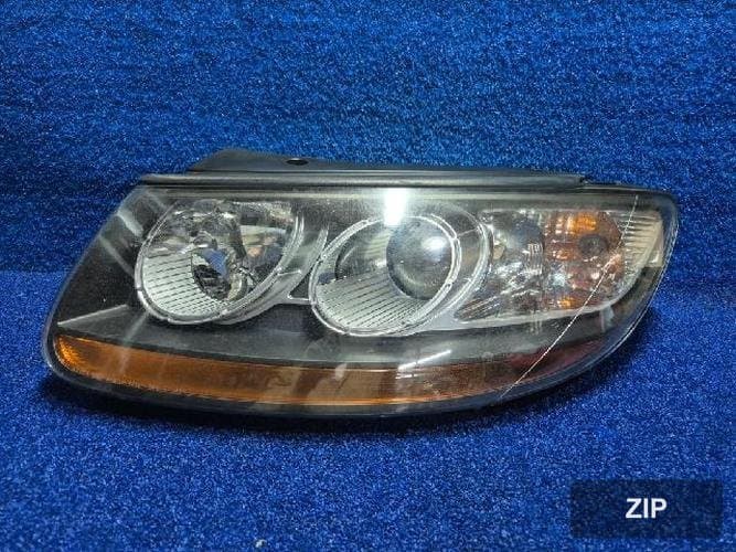 Hyundai Santa Fe 2010 — фара левая 921012BXXX