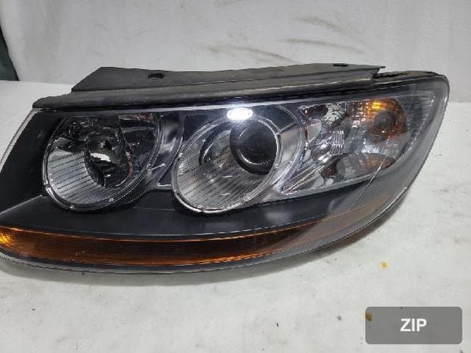 Hyundai Santa Fe 2006 — фара левая (передняя)