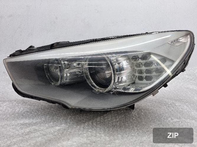 BMW 5 Series 2010 — фара левая (HID)