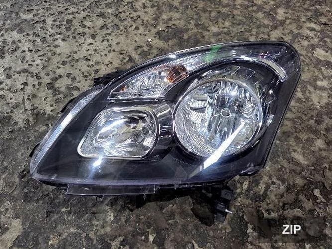 Renault QM5 2010 — фара левая (галоген)