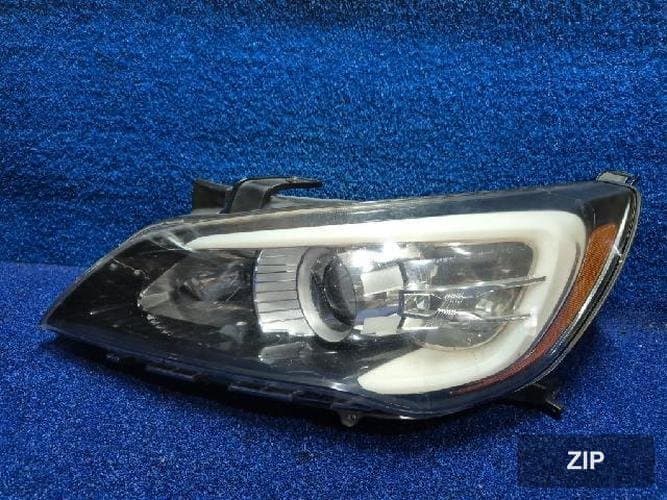 Kia K7 2011 — фара левая 921013RXXX