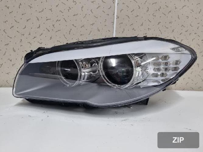 BMW 5 Series 2012 — фара левая