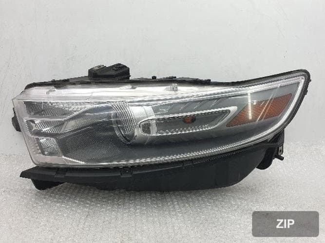 Ford Taurus 2013 — фара левая DG13-13006-AE