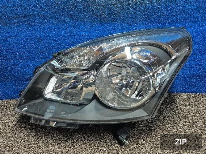 Renault QM5 2011 — фара левая