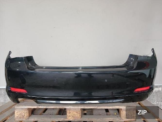 BMW 7 серии 2011 — задний бампер