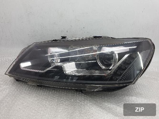 Volkswagen Passat 2013 — фара левая