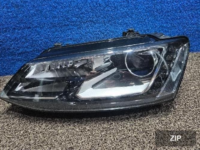 Volkswagen Jetta 2014 — фара левая 5C7941751E