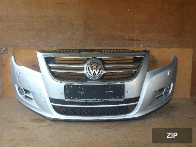 Volkswagen Tiguan 2010 — передний бампер