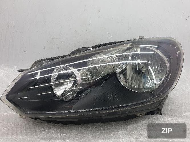 Volkswagen Golf 2013 — фара левая 5K1941006P