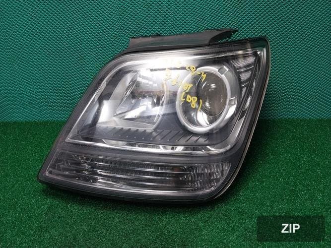Kia Mohave 2008 — фара левая 921012J000