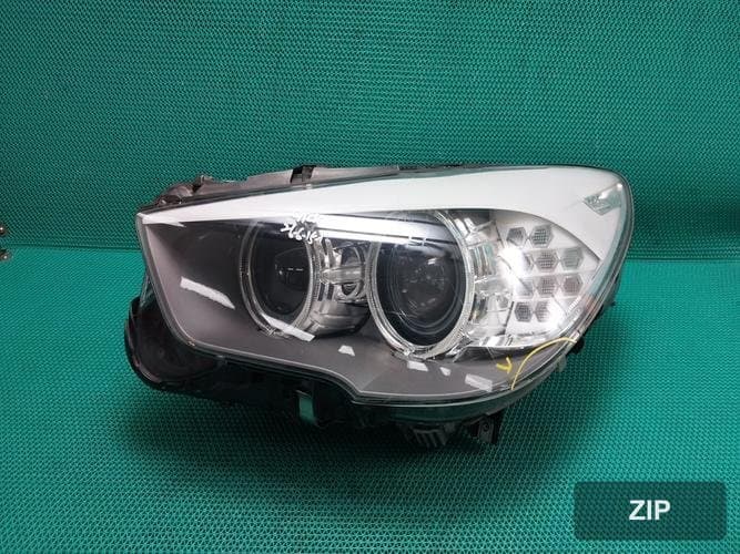 BMW 5 Series 2010 — фара головного света левая (HID)
