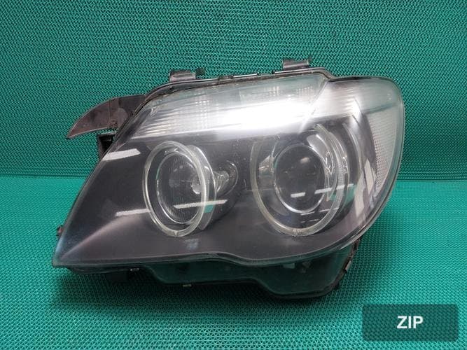 BMW 7 series 2006 — фара левая HID 6937225